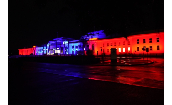 Canberra historic buildings are illuminated in the flag colours of Mongolia